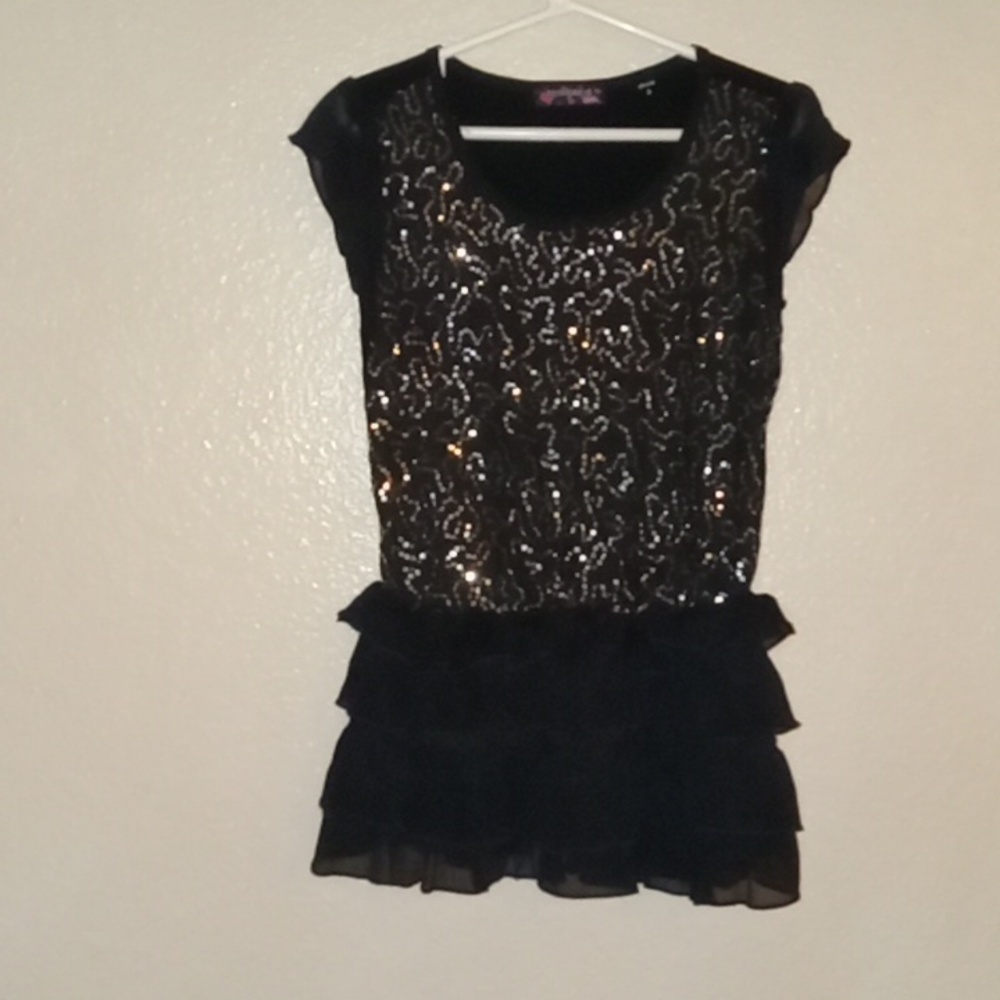 Tempted girl's black sequin dress